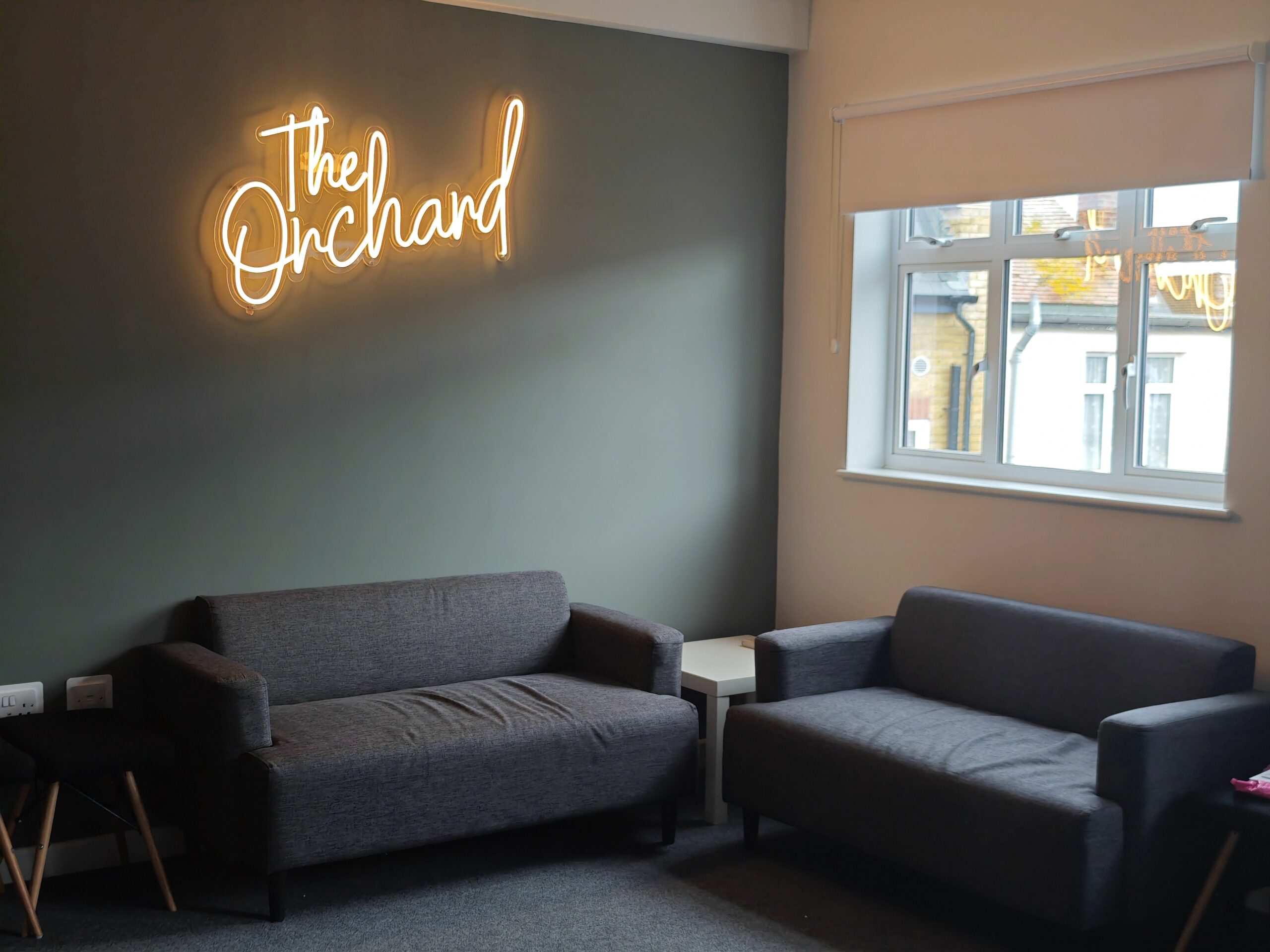 The Orchard – Neon Sign in context